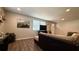Bright living room with hardwood floors, comfortable seating and stylish décor at 111 Palencia Rd, Auburndale, FL 33823