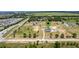 Aerial view of the property, showcasing the home, barn, pool, and spacious lot at 11400 Lovers Ln, Winter Garden, FL 34787