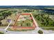 Expansive aerial view of the property showcasing the well-manicured grounds and neighborhood surroundings at 11400 Lovers Ln, Winter Garden, FL 34787