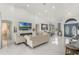Bright and open living space with an electric fireplace and modern decor, perfect for relaxation and entertainment at 11400 Lovers Ln, Winter Garden, FL 34787