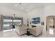 Comfortable living room boasting abundant natural light and a sleek electric fireplace at 11400 Lovers Ln, Winter Garden, FL 34787