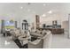 Elegant living area with marble floors, dining space, and open layout to the kitchen at 11400 Lovers Ln, Winter Garden, FL 34787