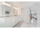 Well-lit bathroom features marble vanity with double sinks, and ensuite access to the main bedroom at 11400 Lovers Ln, Winter Garden, FL 34787