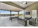 A covered patio with a ceiling fan and a view of a pool at 11400 Lovers Ln, Winter Garden, FL 34787