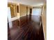 Inviting room with hardwood floors, white trim, and natural light at 12101 Kendra Ct, Orlando, FL 32824