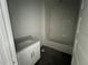 This bathroom is equipped with modern sink and vanity, and a tub with shower at 13540 Autumn Harvest Ave, Winter Garden, FL 34787