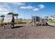 Community playground features a wooden play structure with slides and climbing areas at 13540 Autumn Harvest Ave, Winter Garden, FL 34787