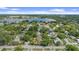 Stunning aerial view of a lakeside neighborhood with lush greenery and beautiful blue water at 1440 Roosevelt St, Orlando, FL 32804