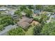 Overhead view of a well-maintained home with a patio and mature landscaping and manicured lawn at 1440 Roosevelt St, Orlando, FL 32804
