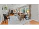Elegant living room featuring a fireplace, hardwood floors, and large windows at 1440 Roosevelt St, Orlando, FL 32804