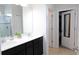 Bathroom features a double sink vanity and walk-in shower at 146 Loblolly Ln, Davenport, FL 33837