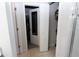 Bathroom featuring access to a walk-in shower and a walk-in closet at 146 Loblolly Ln, Davenport, FL 33837