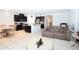 Open-concept living area connects to the kitchen for easy entertaining and comfortable living at 146 Loblolly Ln, Davenport, FL 33837
