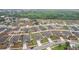 Neighborhood aerial view of homes with private yards, driveways, and proximity to green spaces at 1846 Galloway Ter, Winter Haven, FL 33881