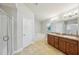 Spacious bathroom with a double sink vanity, tub, and separate shower area at 1846 Galloway Ter, Winter Haven, FL 33881
