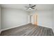 The spacious bedroom features wood-look floors, two doors, and lots of room for your furnishings at 1846 Galloway Ter, Winter Haven, FL 33881
