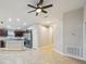 Open kitchen features stainless appliances, granite countertops, and ample cabinet space at 1846 Galloway Ter, Winter Haven, FL 33881