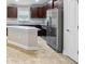 Close-up of the kitchen featuring stainless steel appliances and granite countertops at 1846 Galloway Ter, Winter Haven, FL 33881