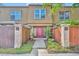 Inviting front entrance with a red door, well-maintained landscaping and clear unit numbers at 200 Saint Andrews Blvd # 1603, Winter Park, FL 32792