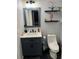 Cozy bathroom featuring a modern vanity, updated fixtures, and decorative shelving for a touch of elegance at 2035 Dixie Belle Dr # 2035C, Orlando, FL 32812