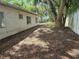 Exterior home in a natural backyard setting at 2464 Lotafun Ave, Winter Park, FL 32789