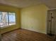 Bedroom featuring laminate floors, a large window, and neutral walls at 2464 Lotafun Ave, Winter Park, FL 32789