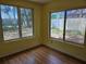 Bedroom featuring laminate floors, natural light, and neutral walls at 2464 Lotafun Ave, Winter Park, FL 32789