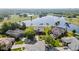 Overhead view of the home on large, beautifully landscaped lot with views of the golf course and lake at 2770 Windsorgate Ln, Orlando, FL 32828