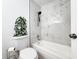 Beautifully renovated bathroom with elegant tile and modern fixtures at 3028 Parkway Blvd # 105, Kissimmee, FL 34747