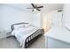 Bedroom features natural light, tiled floor, and ensuite bathroom at 3028 Parkway Blvd # 105, Kissimmee, FL 34747
