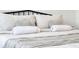 Stylishly decorated bedroom with coordinated pillows and throw blanket at 3028 Parkway Blvd # 105, Kissimmee, FL 34747
