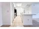 Updated kitchen with stainless steel appliances, quartz countertops and neutral tile flooring at 3028 Parkway Blvd # 105, Kissimmee, FL 34747