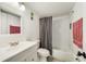Updated bathroom with a shower and tub combo and modern vanity at 3294 S Semoran Blvd # 14, Orlando, FL 32822