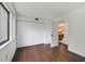 Bright bedroom with wood floors, window and large closet at 3294 S Semoran Blvd # 14, Orlando, FL 32822