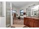 Bathroom featuring a large tub, enclosed shower, and double sinks at 4037 Se 40Th St, Ocala, FL 34480