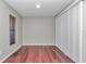 Empty room featuring hardwood floors, white walls, and ample natural light from a window at 4037 Se 40Th St, Ocala, FL 34480