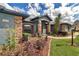 Inviting front entrance with beautiful stone and blue painted exterior at 4037 Se 40Th St, Ocala, FL 34480