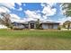 Charming single story home with mature landscaping and stone accents create curb appeal at 4037 Se 40Th St, Ocala, FL 34480