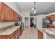 Modern kitchen with granite countertops, stainless steel appliances, and ample cabinetry at 4037 Se 40Th St, Ocala, FL 34480