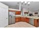 Open kitchen with granite countertops, stainless steel appliances, and spacious layout at 4037 Se 40Th St, Ocala, FL 34480