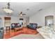 Open floor plan showcasing living room with hardwood floors and granite-topped bar at 4037 Se 40Th St, Ocala, FL 34480