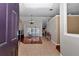 Open-concept living room features lots of light, wood floors, and high ceilings at 4037 Se 40Th St, Ocala, FL 34480