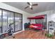 Covered patio with an exercise bike, outdoor furniture, and view to backyard at 4037 Se 40Th St, Ocala, FL 34480