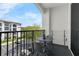 Cozy outdoor balcony featuring seating with views of the community at 4102 Breakview Dr # 30603, Orlando, FL 32819