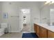 Bathroom with vanity, toilet, and tile floor, designed for comfortable and convenient living at 4102 Breakview Dr # 30603, Orlando, FL 32819