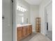 Bright bathroom with a shower and vanity featuring a spacious counter and storage at 4102 Breakview Dr # 30603, Orlando, FL 32819