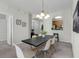 Cozy dining area with views to the kitchen and hallway spaces at 4102 Breakview Dr # 30603, Orlando, FL 32819