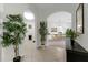 Welcoming hallway with tile flooring leading to the dining area at 4102 Breakview Dr # 30603, Orlando, FL 32819
