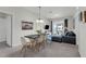 Open-plan living area with balcony access and abundant natural light at 4102 Breakview Dr # 30603, Orlando, FL 32819
