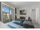 Relaxing living room with sliding glass doors to a private balcony at 4102 Breakview Dr # 30603, Orlando, FL 32819